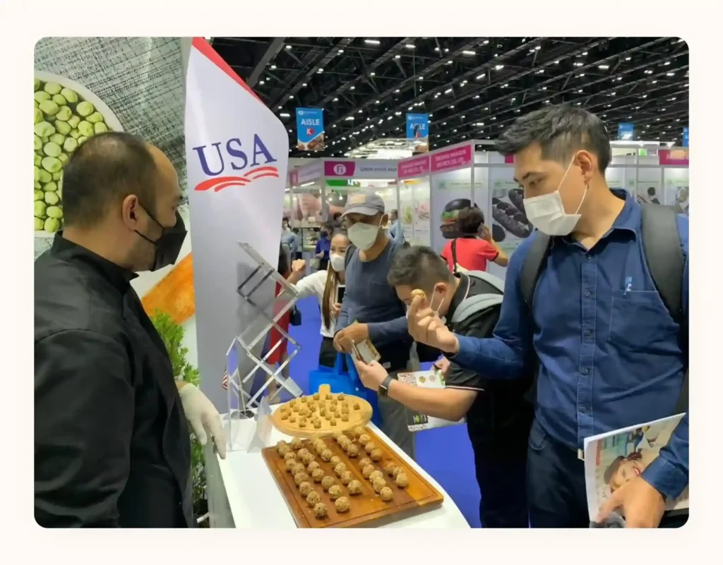Food tasting booth with crowd-friendly sample service pulses.asia Food tasting booth with crowd-friendly sample service pulses.asia