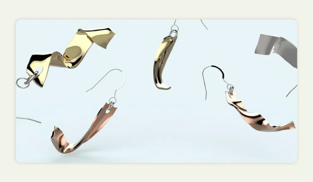 Gold earrings with twisted designs created via 3D printing Gold earrings with twisted designs created via 3D printing