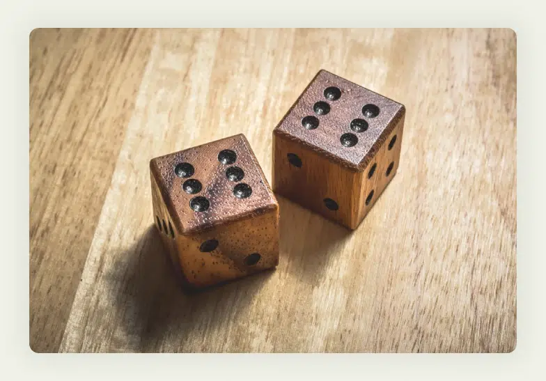 Two dice showing matching numbers on trade show table 