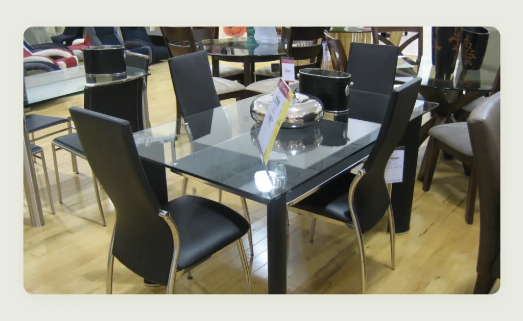 A product shot of a dining table with a cluttered background A product shot of a dining table with a cluttered background