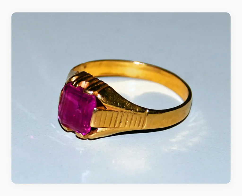 A gold ring in a plain background A gold ring in a plain background